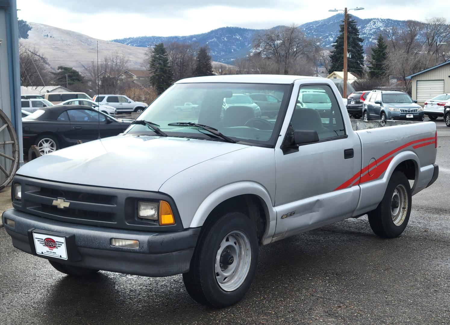 1994 Silver /Brown Chevrolet S10 Pickup (1GCCS144XR8) with an 2.2L I4 engine, 5 Speed Manual transmission, located at 450 N Russell, Missoula, MT, 59801, (406) 543-6600, 46.874496, -114.017433 - Good running little truck. 5 Speed Manual Transmission. AM FM Cassette. Financing NOT Available. - Photo#1